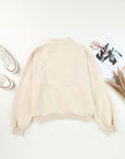 Solid Half-Zip Reverse Seam Pocketed Sweatshirt