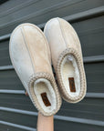 Cow print bruin slippers