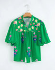 Floral Tassel Tie Split Neck Short Sleeve Blouse