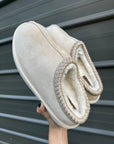 Cow print bruin slippers