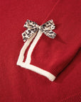 Leopard Bow Split Cuff Contrast Trim Sweater