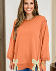 Floral Bow Tie Patch Reverse Seam Sweatshirt