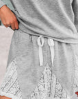Lace Patchwork Pullover and Drawstring Skort Set