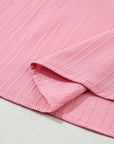 Capri Ruffled Half Sleeve V Neck Textured Top.