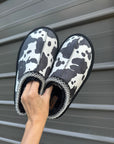 Cow print bruin slippers