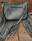 Western-Inspired Hand-Tooled Leather Purse With Fringed Edges And Detachable Strap
