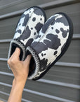 Cow print bruin slippers