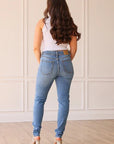 THE PARIS HIGH RISE LIGHT WASH SKINNY JEAN