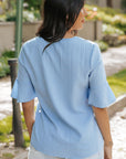 Capri Ruffled Half Sleeve V Neck Textured Top.