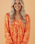 Abstract Collared V-Neck Babydoll Blouse