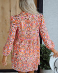 Abstract Long Sleeve Tied Neck Mini Dress