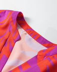 Abstract V-Neck Cuffed Short Sleeve Blouse