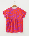 Abstract V-Neck Cuffed Short Sleeve Blouse