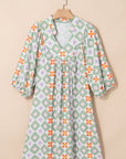 Reagan Floral Print 3/4 Sleeve Notched Neck Mini Dress
