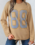 Macy Drawstring Hemline Oversize Long Sleeve Top