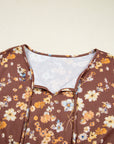 Plus Size Floral Textured Tied Neck Babydoll Blouse