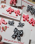 Bag of 25 -Boutique 3d Printed Package Inserts Cow Print Bows Pins or Earrings Made in America