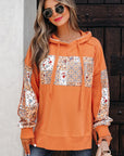 Myrassa Side Slit Drawstring Hoodie