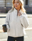 Solid Half-Zip Reverse Seam Pocketed Sweatshirt