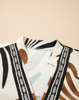 Abstract V-Neck Puff Sleeve Blouse
