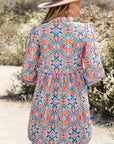 Abstract Long Sleeve Tied Neck Mini Dress