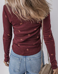 Floral Ribbed Notched Neck Long Sleeve Top