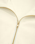 Solid Zip-Up Collared Ruffle Short Sleeve Blouse