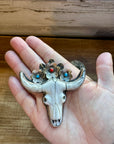 Big Antler longhorn with  turquoise pendant with color flowers