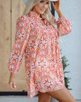 Abstract Long Sleeve Tied Neck Mini Dress