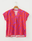 Abstract V-Neck Cuffed Short Sleeve Blouse
