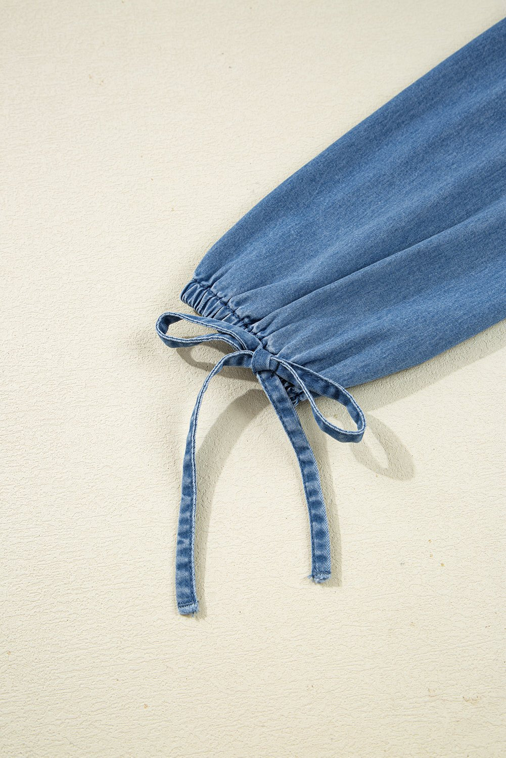 Emmy Sleeve Tied Peplum Top