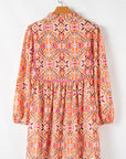 Abstract Long Sleeve Tied Neck Mini Dress