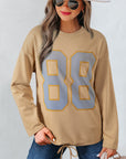 Macy Drawstring Hemline Oversize Long Sleeve Top