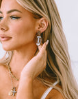 Brown Glittering Football Pendant Earrings