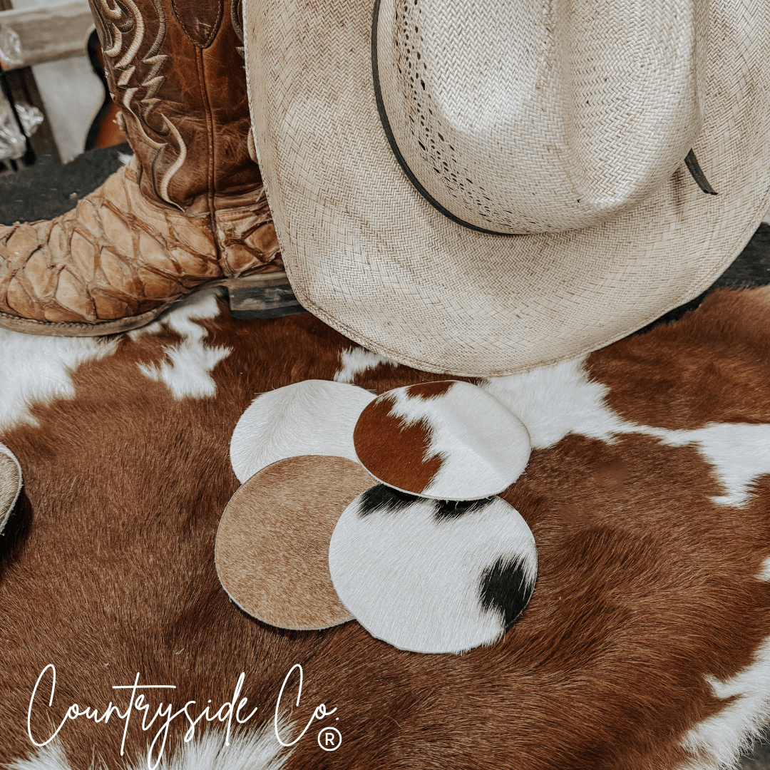 Naturally Toned Cowhide Coaster Set Featuring Unique Handcrafted Patterns For Everyday Use