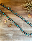 30 inch long shell and turquoise necklace