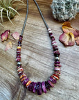 22 Inch graduated deep purple spiny and sterling silver pearls