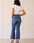 THE BLAKE MID WASHED MID RISE DISTRESSED CROP FLARE