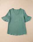 Capri Ruffled Half Sleeve V Neck Textured Top.