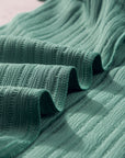 Capri Ruffled Half Sleeve V Neck Textured Top.