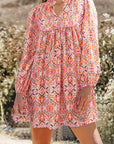 Aisha Long Sleeve Tied Neckline Mini Dress