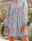 Abstract Long Sleeve Tied Neck Mini Dress