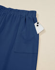 Plus Size Solid Asymmetrical Hem Capris Pants