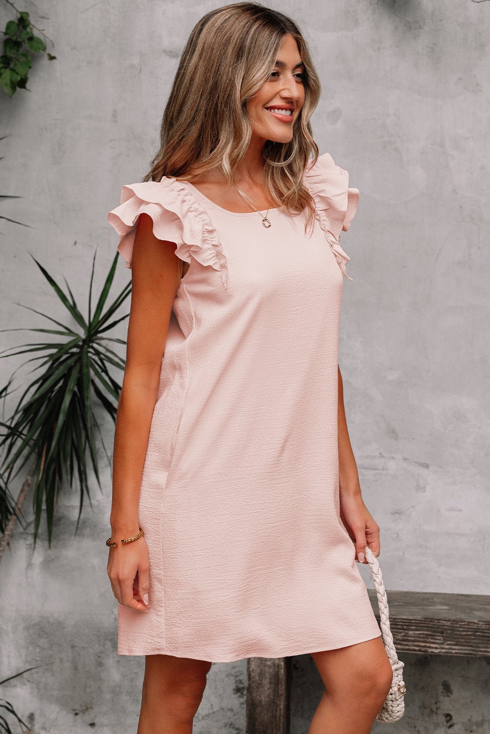 Abigail Textured Flutter Sleeve Bow Back Mini Dress