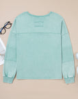 Mineral Wash Reverse Seam Buttoned V-Neck Top