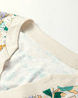 Floral Button Notch V-Neck Long Sleeve Top