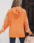 Myrassa Side Slit Drawstring Hoodie