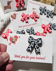 Bag of 25 -Boutique 3d Printed Package Inserts Cow Print Bows Pins or Earrings Made in America